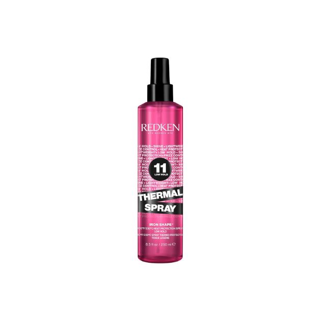 a pink bottle of hair spray